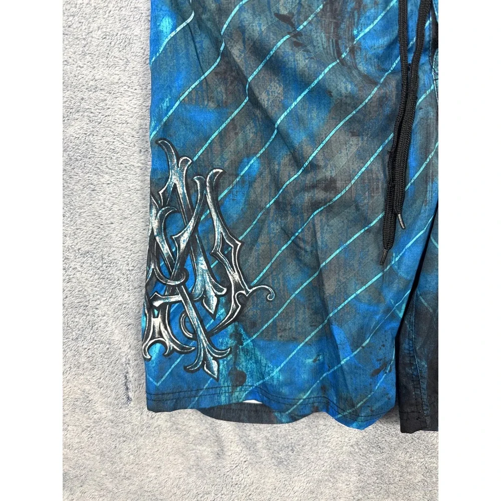 MMA Elite Mens Size M Blue Board Shorts Graphic Cross Wing Swim Trunks